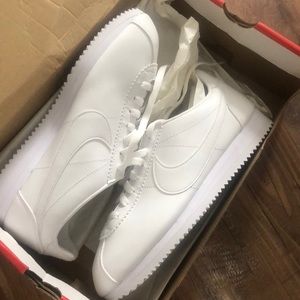 white nike women’s Cortez sneakers